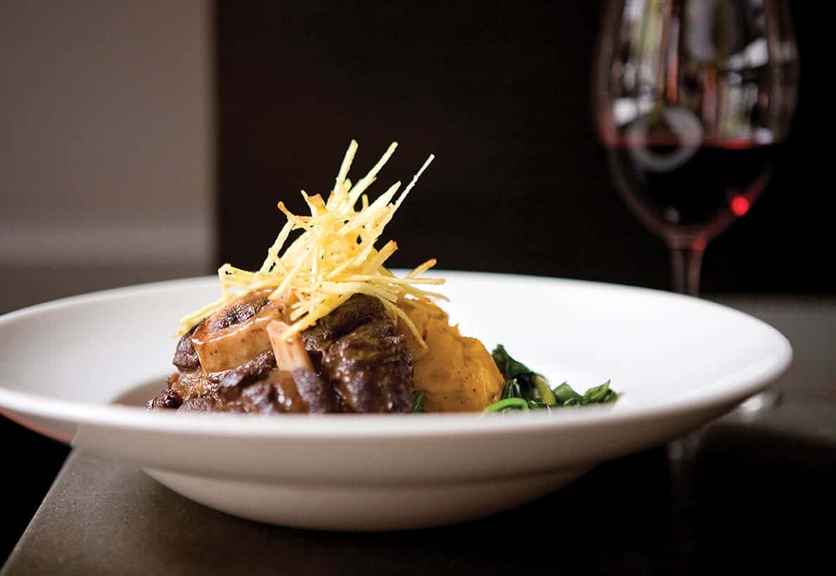 Slow-Braised Venison Osso Buco with Roasted Butternut Squash Mash and Sauteed Beet Greens