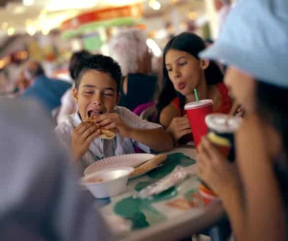 How do calorie labels on menus affect our eating patterns?