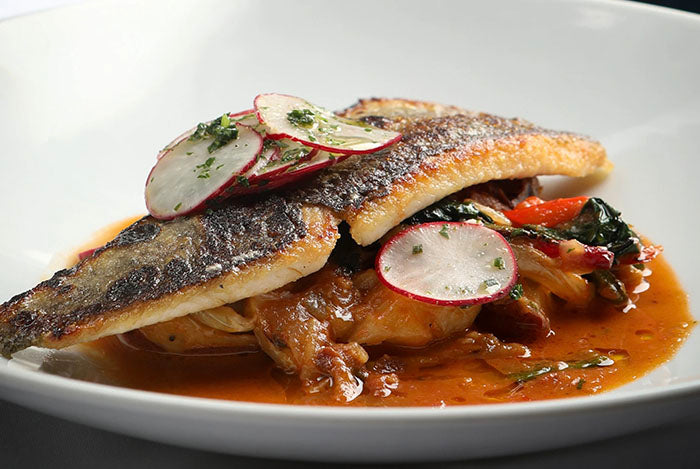 North Carolina Rainbow Trout with new potatoes, fennel, sweet peppers and spicy broth