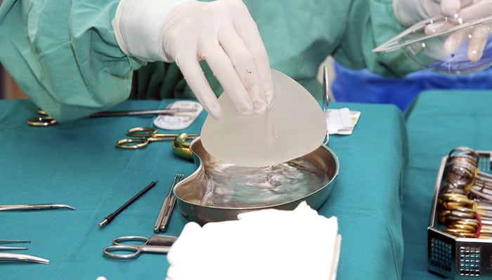 Thousands of women say they have a mysterious ‘breast-implant illness.